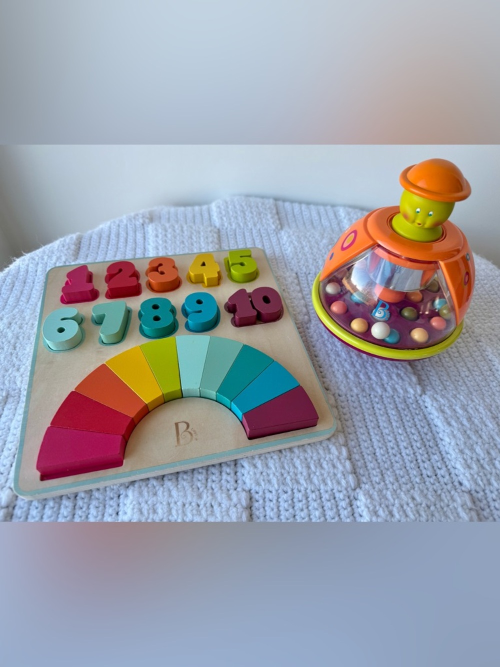 B. Toys Poppitoppy Ball Popper and Counting Rainbows Wooden Number Puzzle